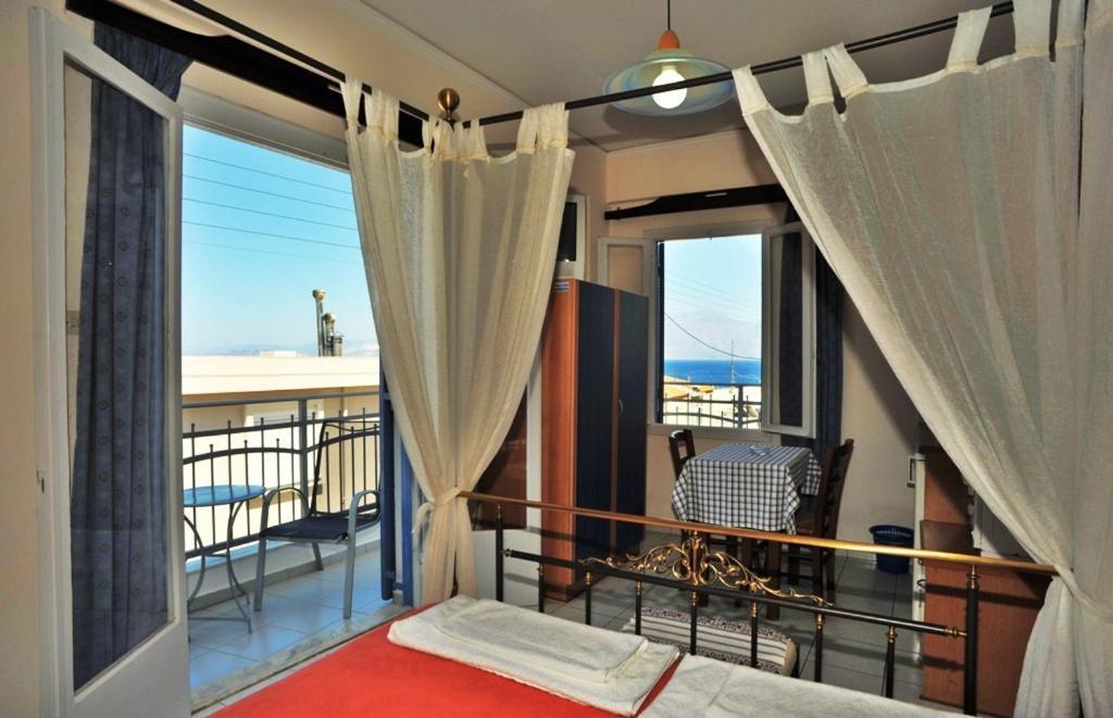Pergola Hotel อายิโอสนิโกลาโอส ห้อง รูปภาพ
